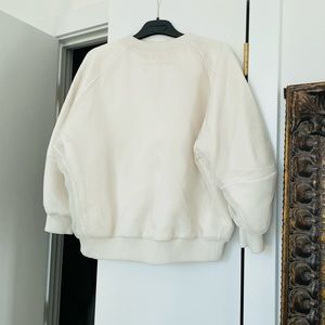 Alexander McQueen. Authentic. Cream sweater. Great condition. size 42 fits M